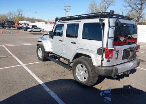2011 Jeep Wrangler Unlimited Sahara из США, поврежденный, VIN 1J4HA5H19BL615748